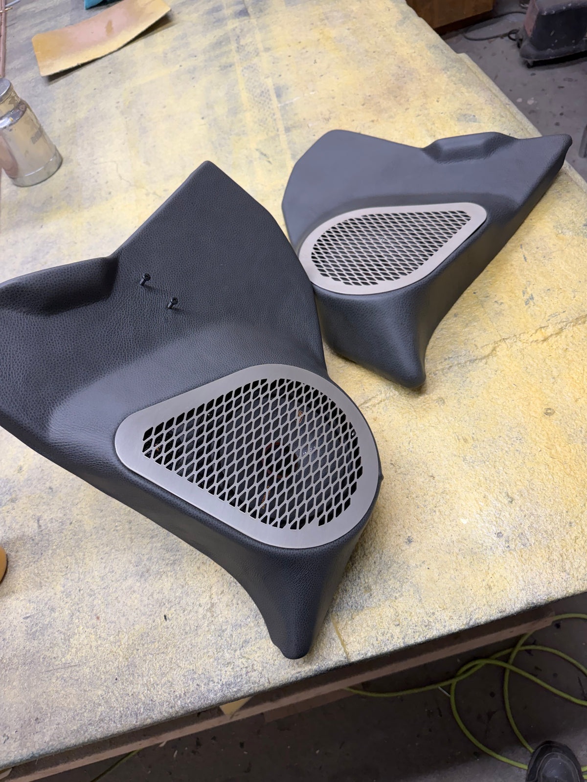 Pair of custom kick panels with stainless grilles, 73-87 GM truck