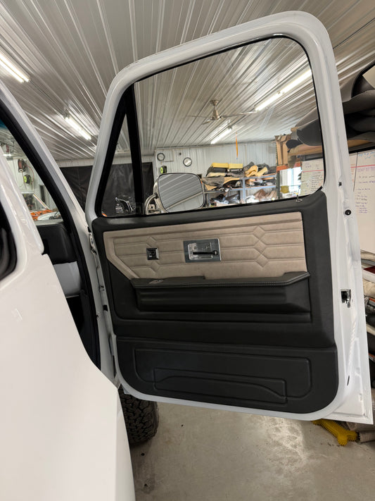 Legacy Series rear door panel in black with cream hex-stitched insert, crew cab