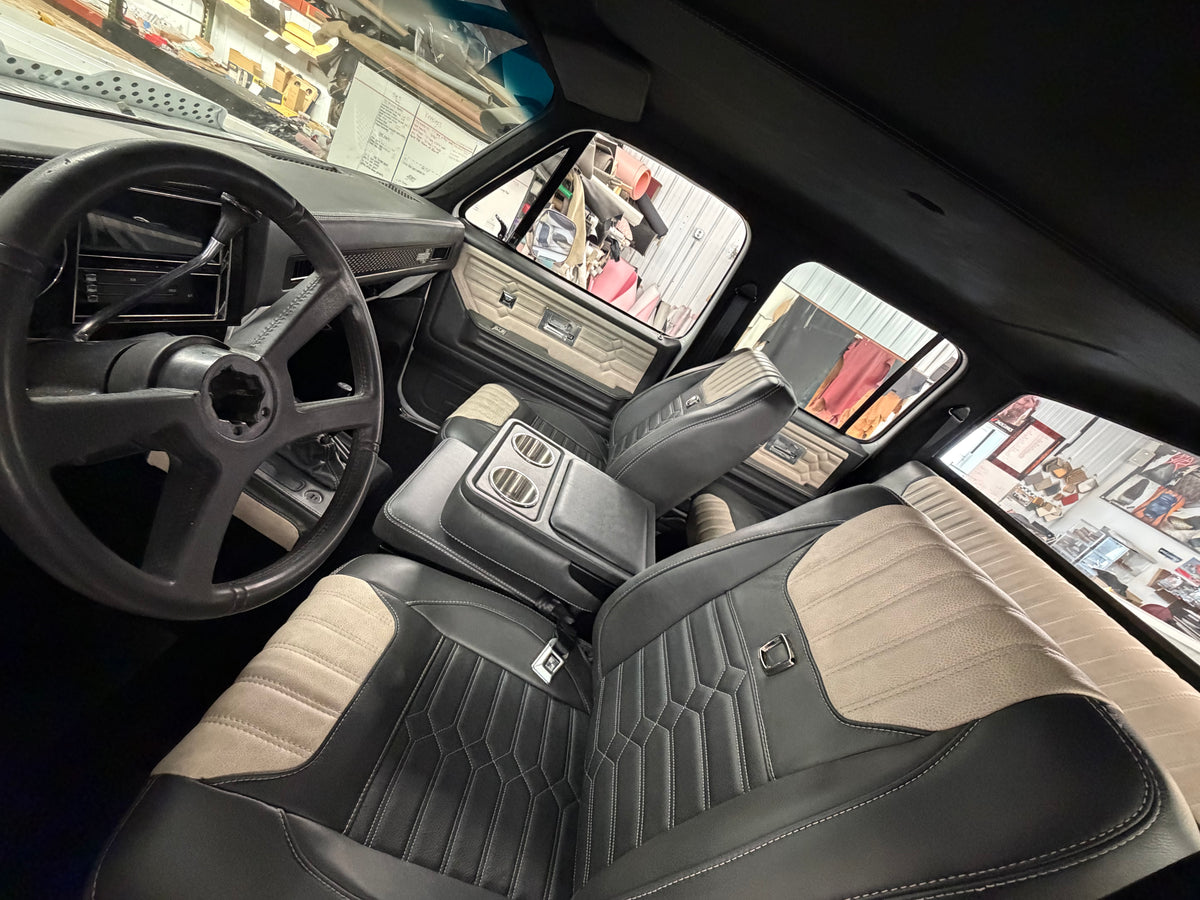 Driver view of a Legacy Series interior with leather wrapped dash