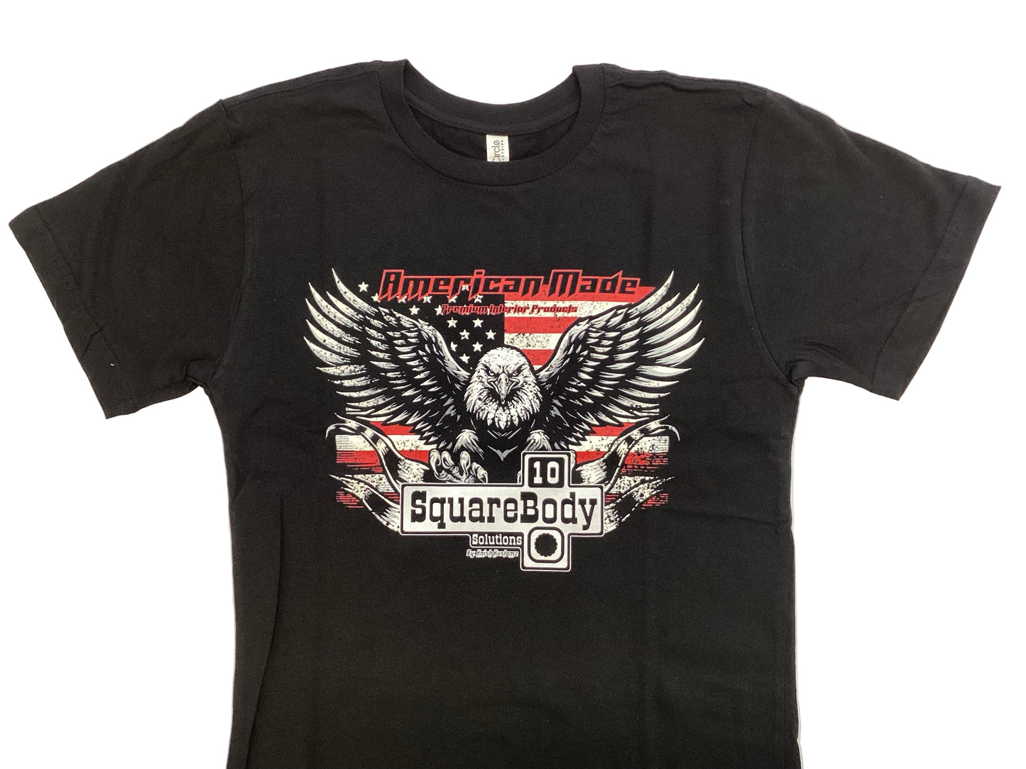 Black t-shirt with an eagle graphic and Square Body Emblem on an American Flag