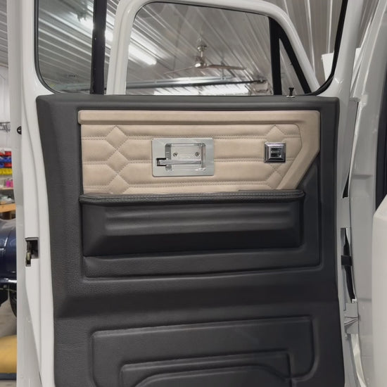 Legacy Series door panels in black with cream hex-stitched inserts